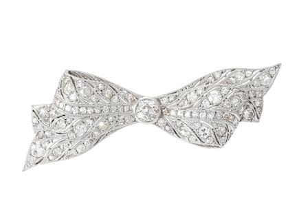 BROOCH, bow, platinum, old European- and single cu