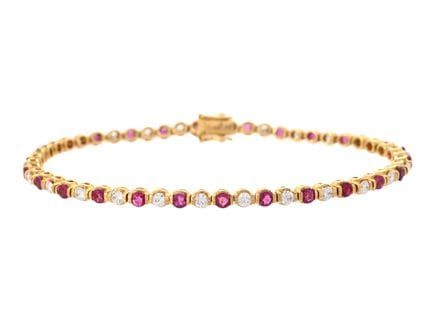 TENNIS-ARMBAND, 18-karätiges Gold, 27 Rubine, 26 D