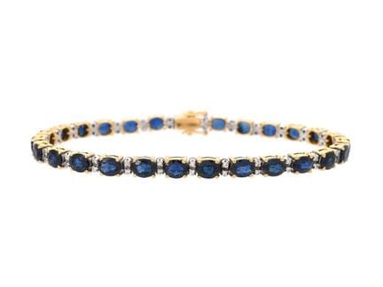 ARMBAND, 18 Karat Gold/Weißgold, 27 blaue Saphire 