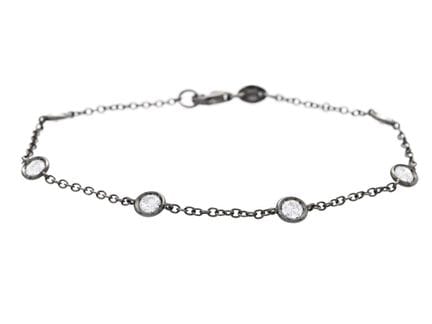 BRACELET, or 18 carats, plaqué rhodium noir, 6 dia