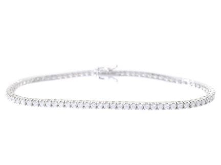 TENNIS BRACELET, 18K white gold, 77 brilliant cut 