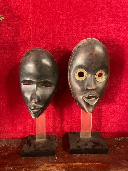 DAN, Ivory Coast 
Two weathered wooden masks 
As i
