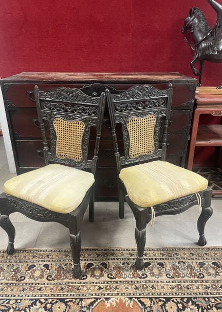 Pair of black-painted, molded-wood chairs 
Seat an
