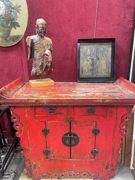 Red-painted wooden sideboard
Features two drawers 