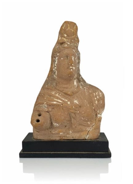 ROMAN TERRACOTTA
Roman votive figurine

Made of be