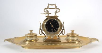 Gilded bronze desk clock shaped like an inkwell.
(
