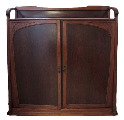 Carved wooden display cabinet with two hinged door