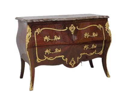 A curved chest of drawers on all sides, made of wo