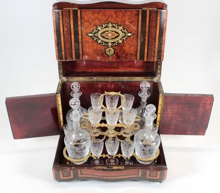 Liquor cabinet made of veneered wood with brass an