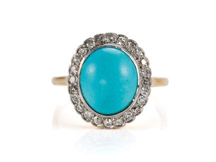 Anello con turchese e diamanti in oro giallo 750

