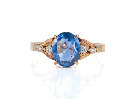 Anello discreto in oro giallo 585 con zaffiro e br