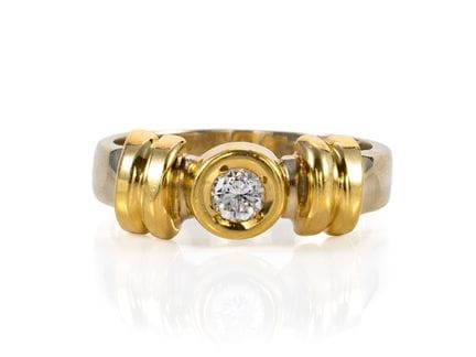 Anello con brillante in oro giallo e oro bianco 75
