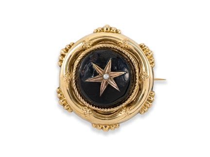 Antike Brosche aus Gold mit schwarzem Emaille und 