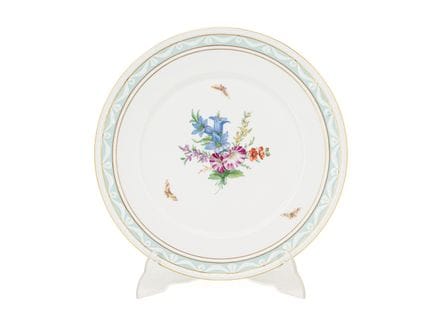 “库尔兰”餐盘，柏林KPM，1962-1992年

出自“库尔兰”系列的多色花卉与蝴蝶图案瓷质餐盘。