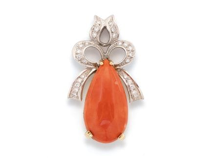 A very fine pendant in 18k white and yellow gold w