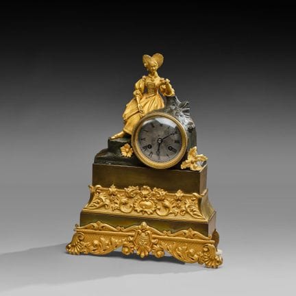 Orologio romantico in bronzo patinato e bronzo dor
