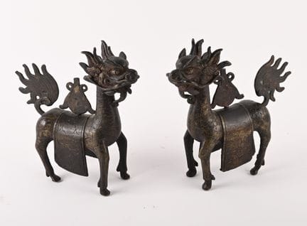 Cina, intorno al 1900.
Coppia di qiling in rame. 
