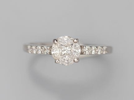 Anillo de oro blanco 750°/°° (18K), engastado con 
