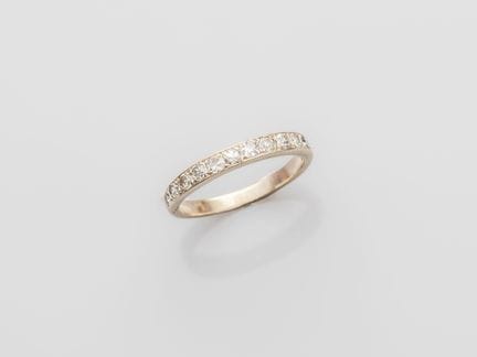 Alliance en or gris 750°/°° (18K), sertie de diama