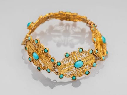 Bracelet en or jaune 750°/°°(18K), formé de  cinq 