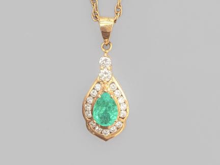 Anhänger aus 750°/°° (18 K) Gelbgold, besetzt mit 
