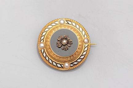 Broche ronde du XIXème siècle, en or jaune 750°/°°