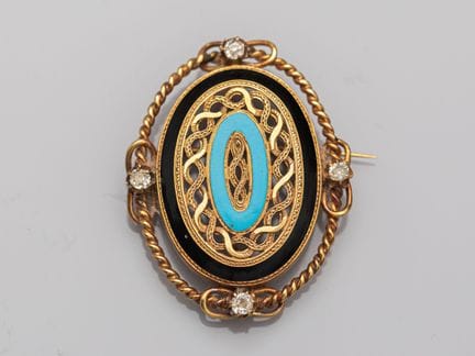 Broche ovale ancienne du XIXème siècle en or jaune