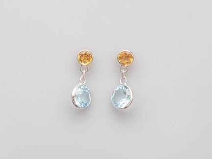 Ein Paar Ohrringe aus 750°/°° (18 K) Gelbgold, bes