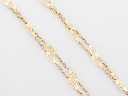 Lunga catena da gilet in oro giallo 750°/°° (18 ca