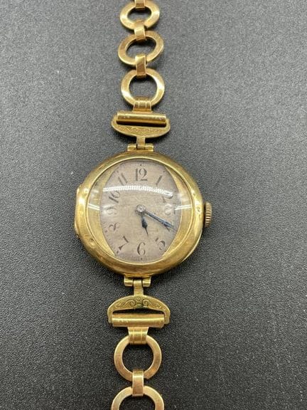 Orologio da donna in oro giallo, cinturino in meta