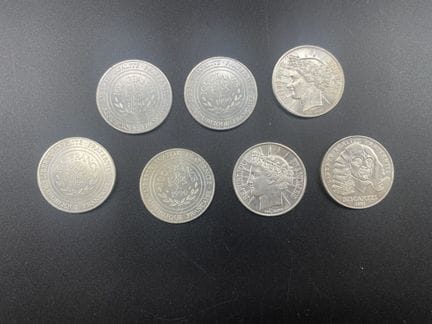 set da 7 monete da 100 franchi in argento. PESO: 1