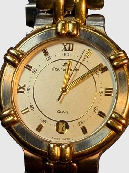 Quartz case "Maurice Lacroix," movement running, d