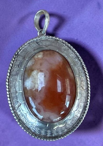 Large silver-plated pendant with a brown stone, H-