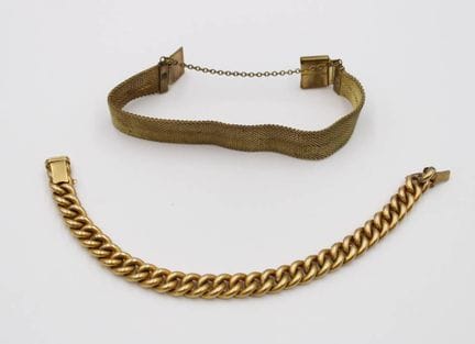 2 gold-colored bracelets, likely gold-plated, L-19