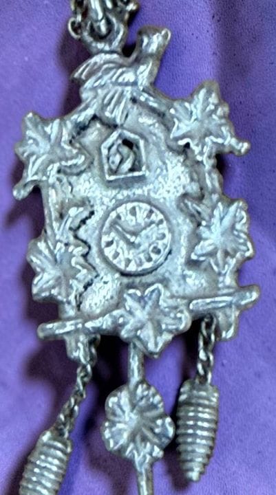Delicate silver chain with a pendant in the shape 