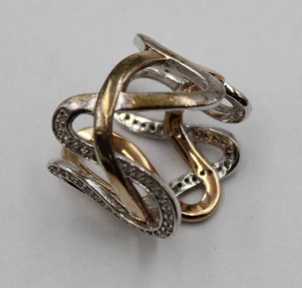 Anillo bicolor de plata (certificado), piedras tra