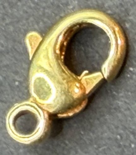 Petit mousqueton doré, 0,716 g.