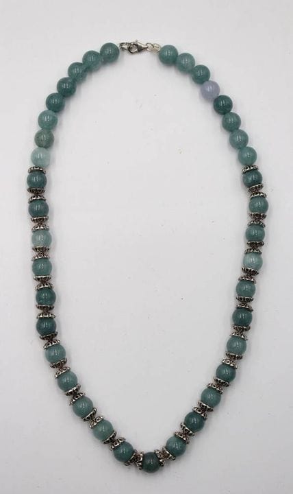 Collana con perle levigate (amazzonite?), elementi