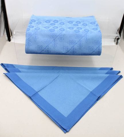 Table runner by Georg Jensen (label) and 3 blue cl