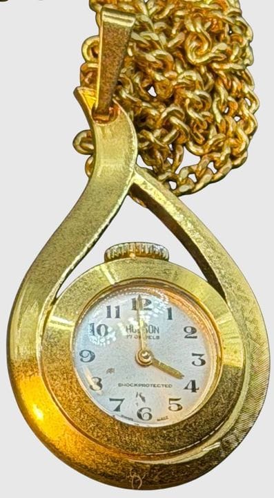 mechan. Damenumhängeuhr an langer Double-Kette "Hu
