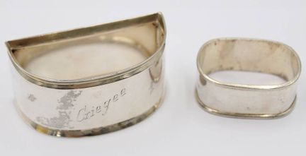 2 servilleteros variados, plata 925/800, 1 grabado