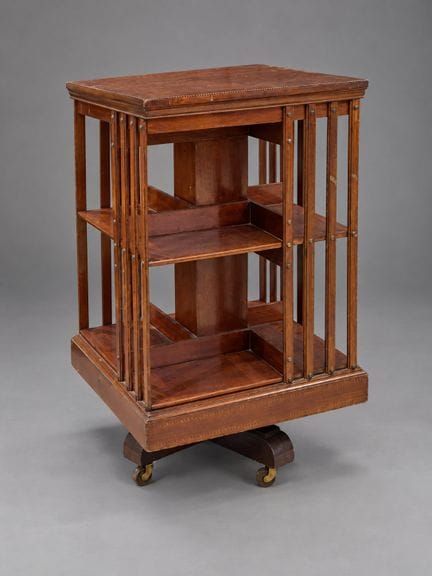 Bibliothèque tournante en acajou et filets de bois