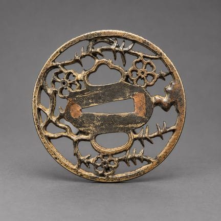 Maru gata tsuba en fer à décor ajouré en kyo-sukas