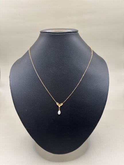 Collier en or jaune 18K 750‰, ornée d'une perle de