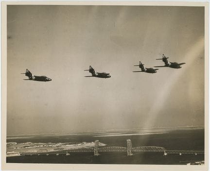 c. 1953 US Navy F9F-5 Panther Jets Flying over San