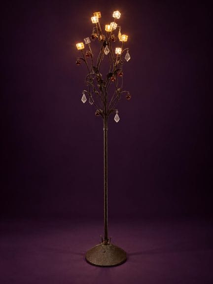 Lampada da terra in metallo e vetro raffigurante u