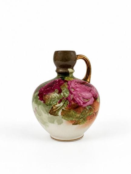 Limoges ARG 
Une cruche en porcelaine de Limoges é
