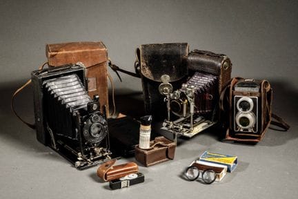Set composto da tre macchine fotografiche diverse,