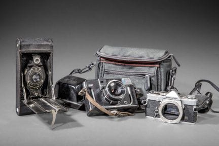 Set composto da tre macchine fotografiche diverse,