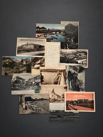 A box of postcards containing approximately 500 ca